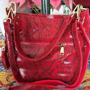 Red Shoulder Bag with Gold Chain Handles and Glossy Finish